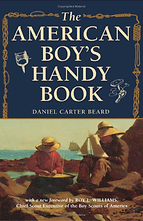 two boys making boats