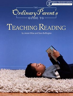 A boy on rug reading