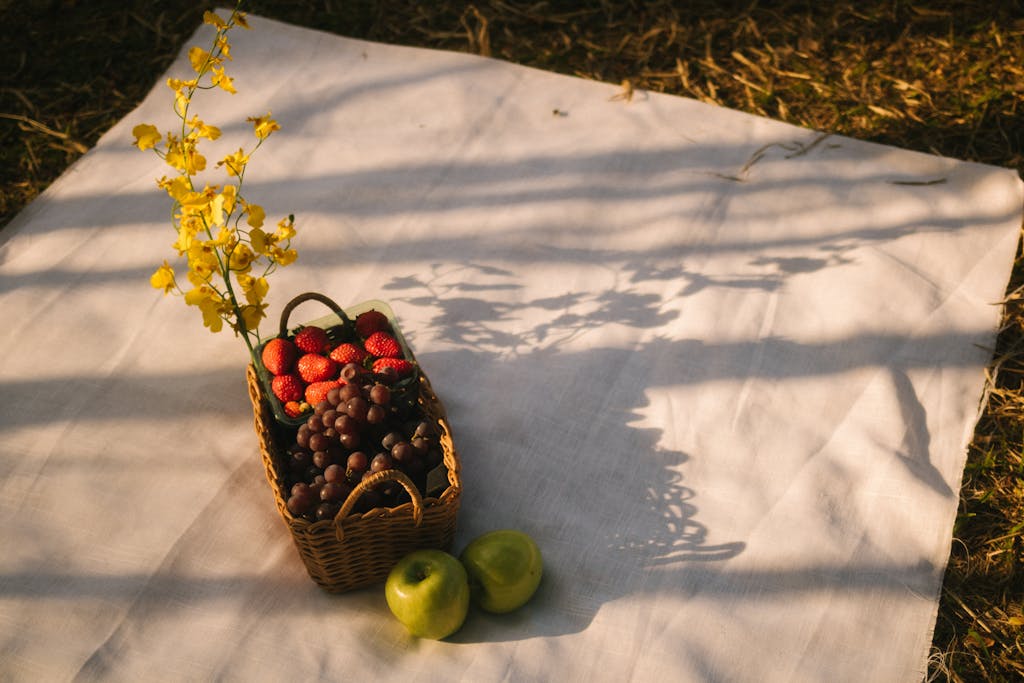 Basket of Fruit on White Cloth for an October family activity