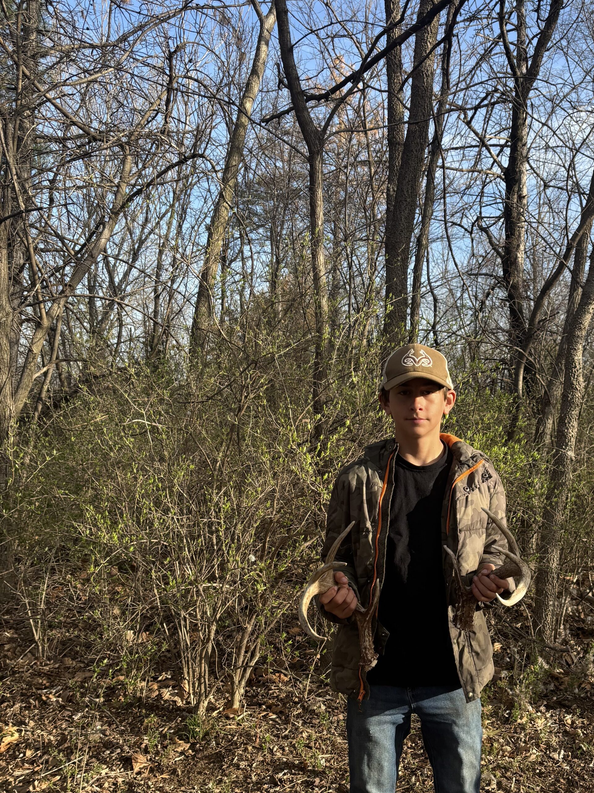 boy after deer shed hunting